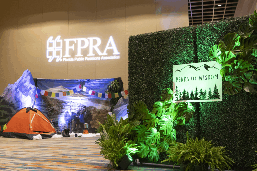 image of Peaks of Wisdom backdrop that includes greenery and plants